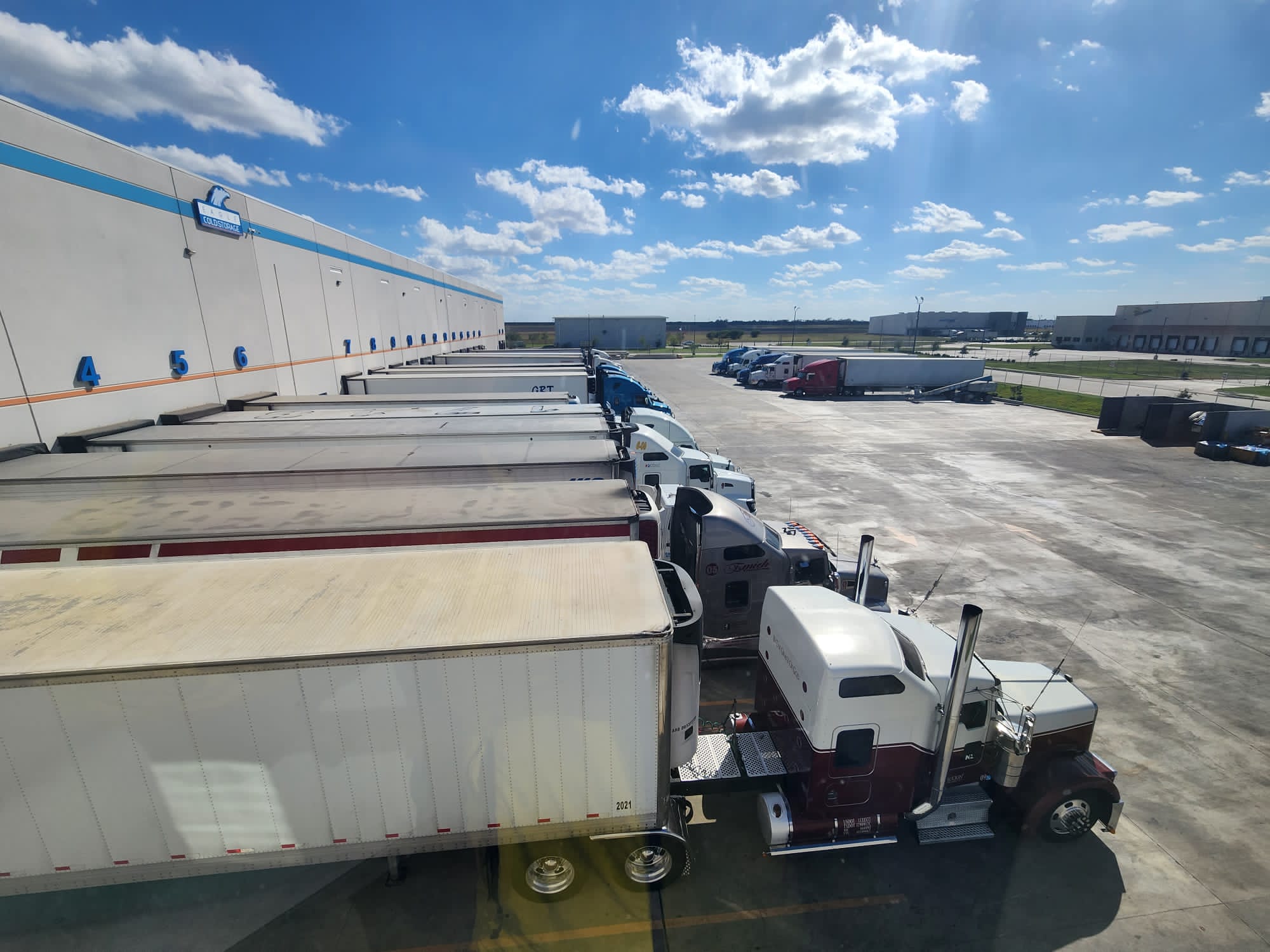 Truck yard beside the cold storage facility